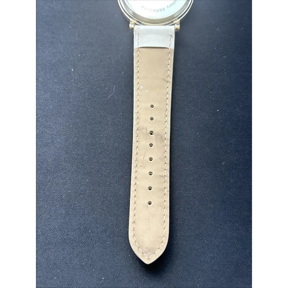 Gold Tone White Band Striped Dial Women’s Quartz Watch